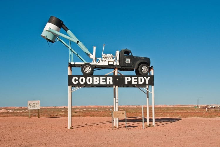 Sign board with minning truck, Coober Peddy.